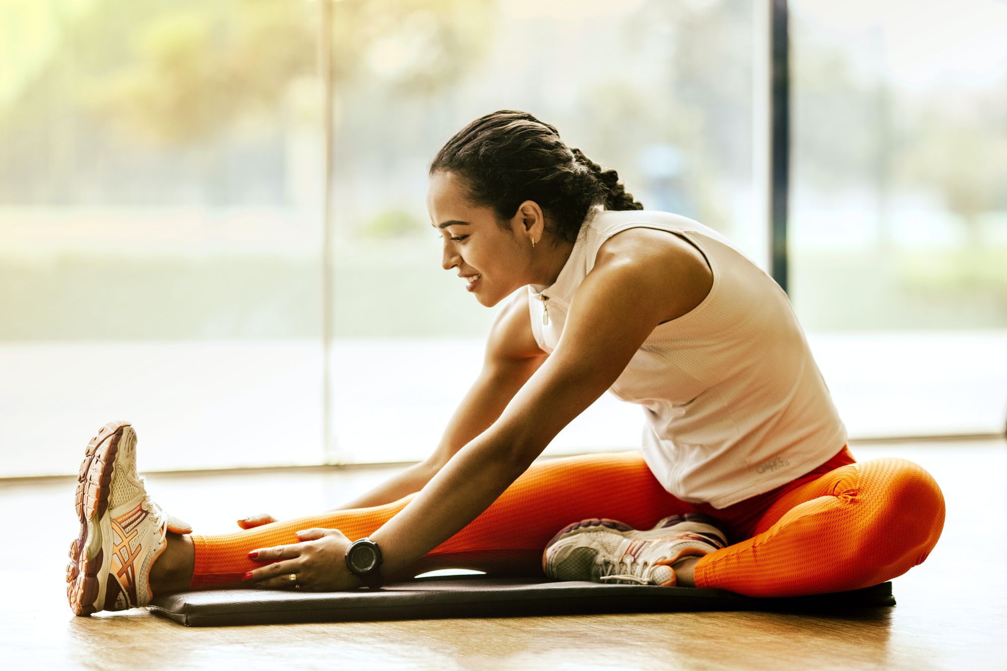 Photo by Jonathan Borba - Seated hamstring stretch