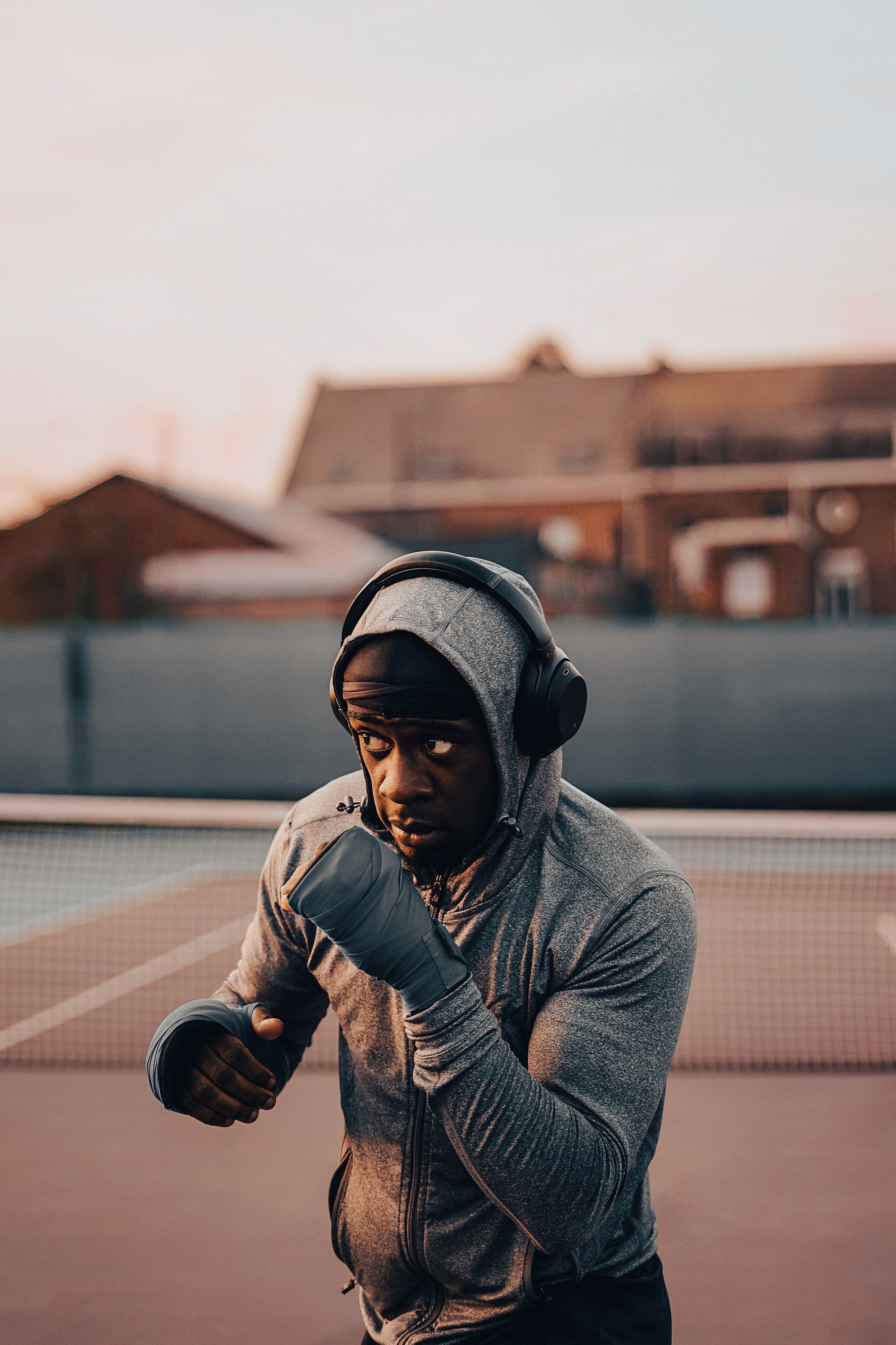 shadow boxing with headphones in