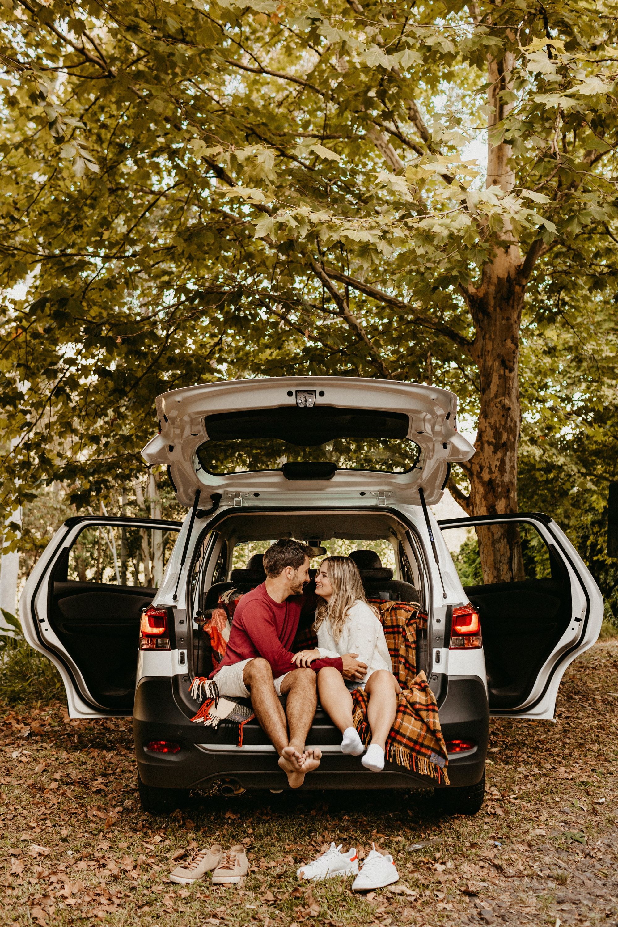 couple sitting in the back of a car