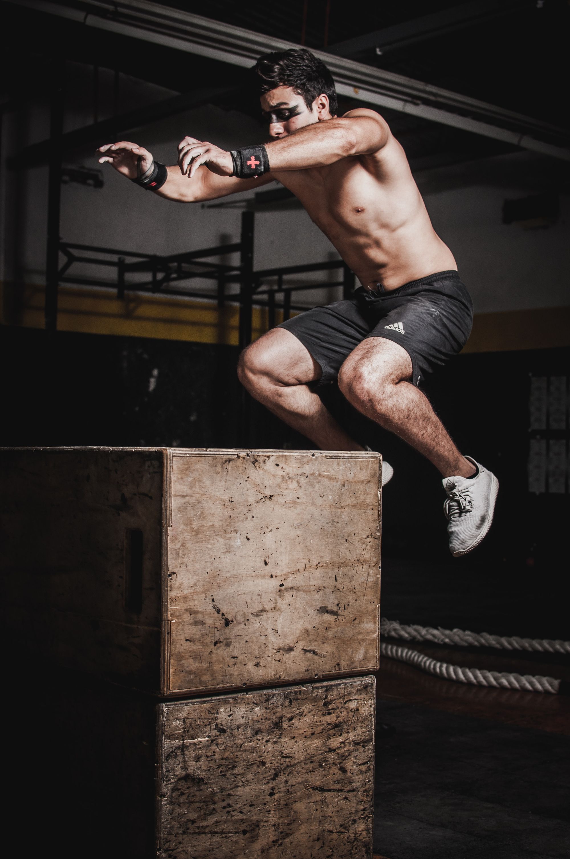 man jumping on a box