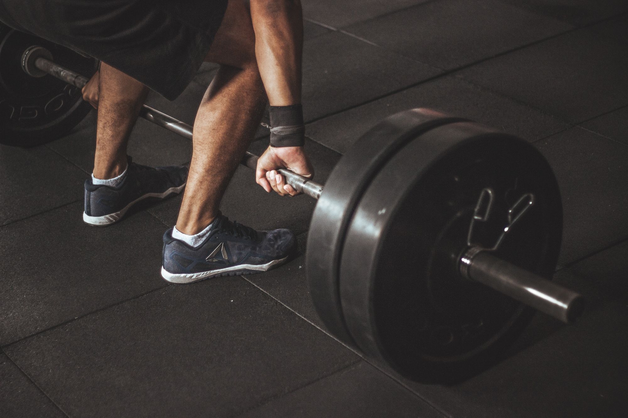 Photo by Victor Freitas: https://www.pexels.com/photo/man-in-black-reebok-shoes-about-to-carry-barbell-949129/