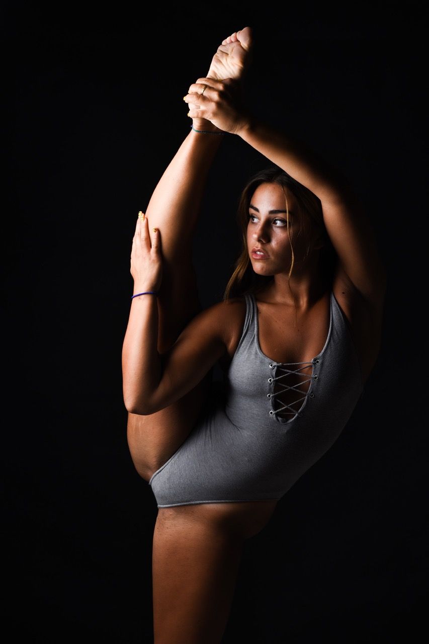 Photo by Andrea Musto: https://www.pexels.com/photo/woman-posing-with-leg-raised-14137824/
