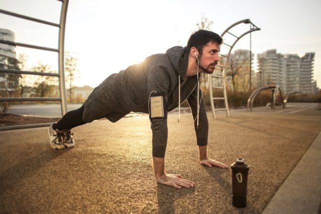 Photo by Andrea Piacquadio: https://www.pexels.com/photo/man-in-gray-jacket-doing-push-ups-during-sunrise-3775164/