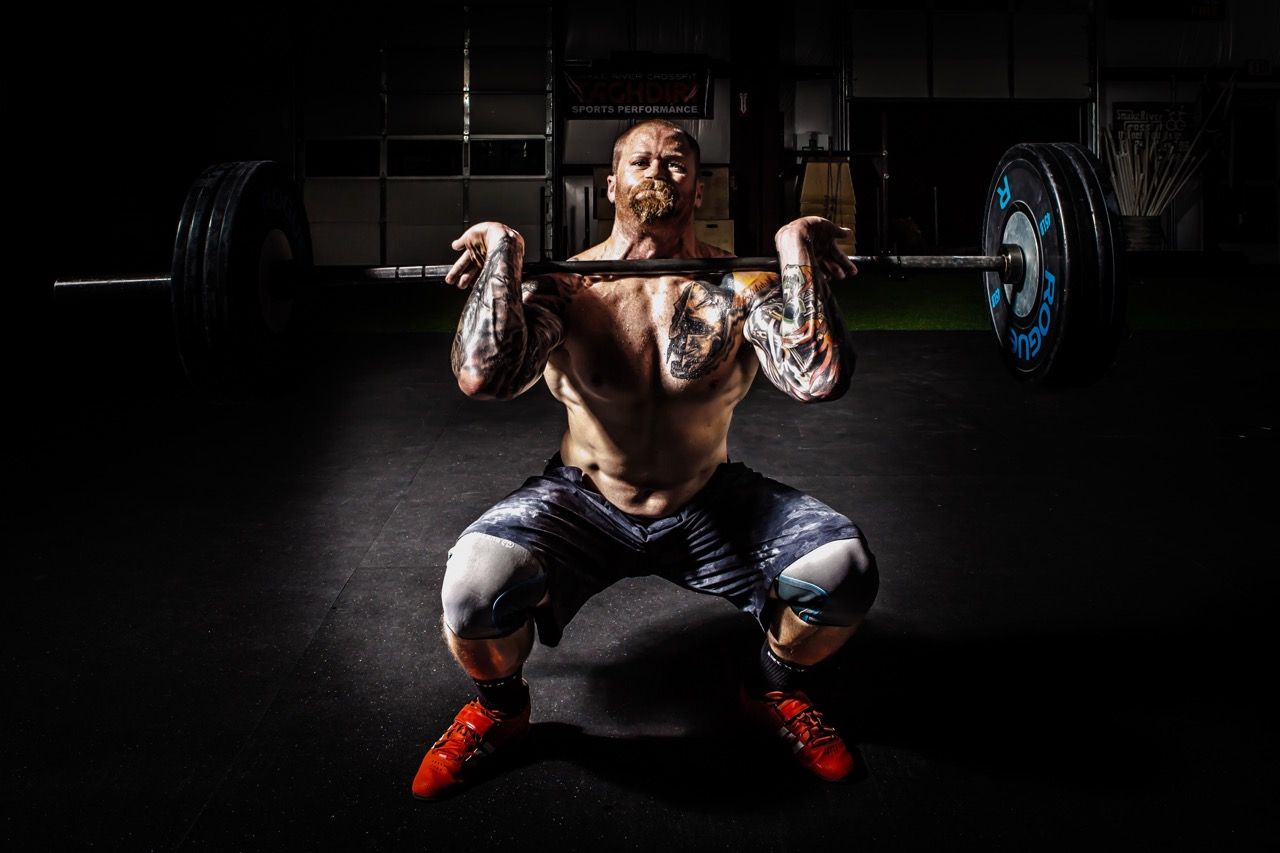 Photo by Binyamin Mellish: https://www.pexels.com/photo/man-in-black-shorts-carrying-adjustable-barbells-116077/