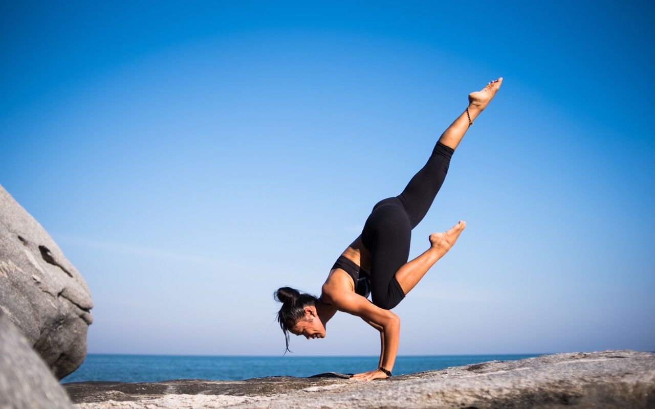 Photo by Chevanon Photography: https://www.pexels.com/photo/low-angle-view-of-woman-relaxing-on-beach-against-blue-sky-317157/