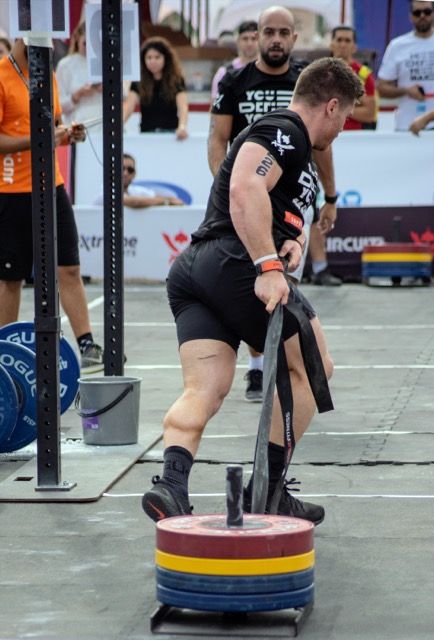 Photo by Frans van Heerden: https://www.pexels.com/photo/man-carrying-barbell-plate-outdoors-1566403/