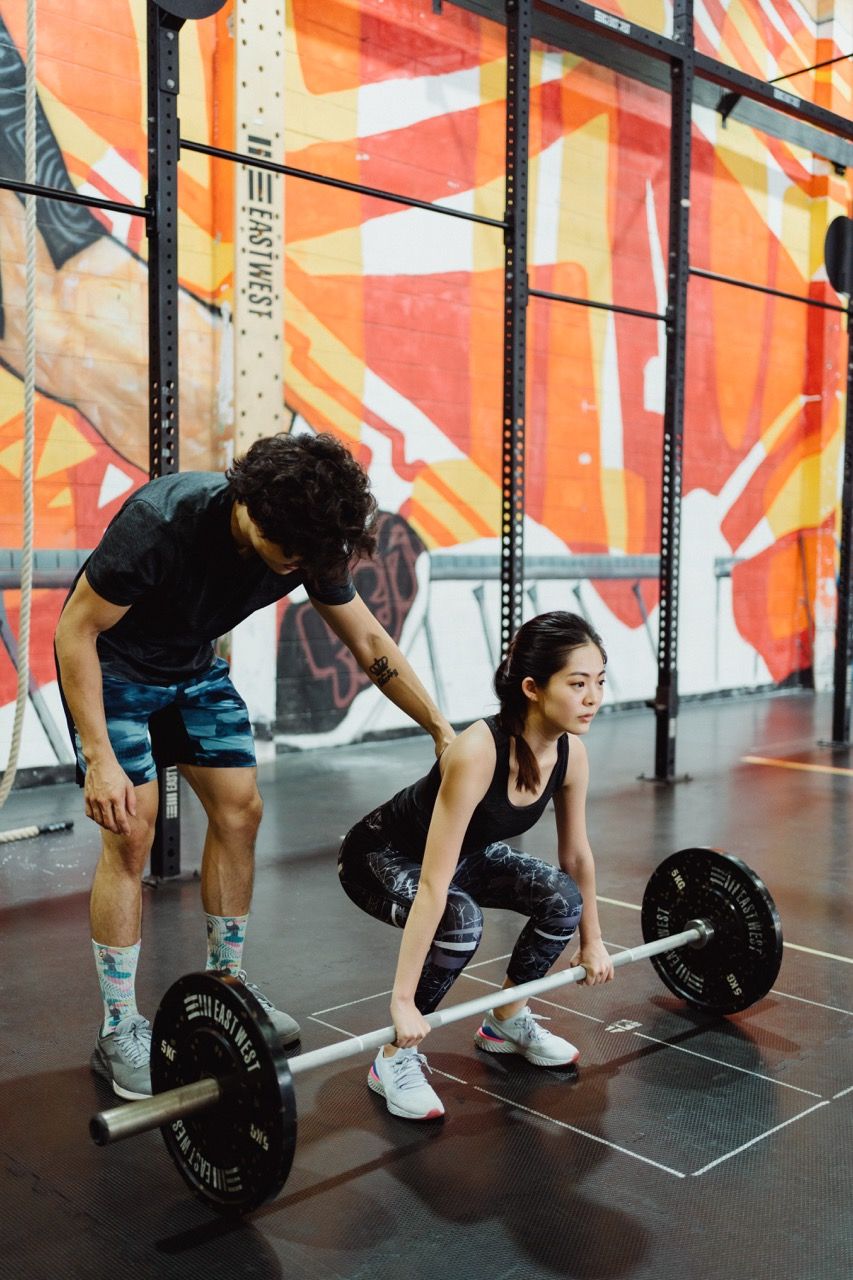 Photo by Ketut Subiyanto: https://www.pexels.com/photo/trainer-helping-client-lifting-barbell-4853295/