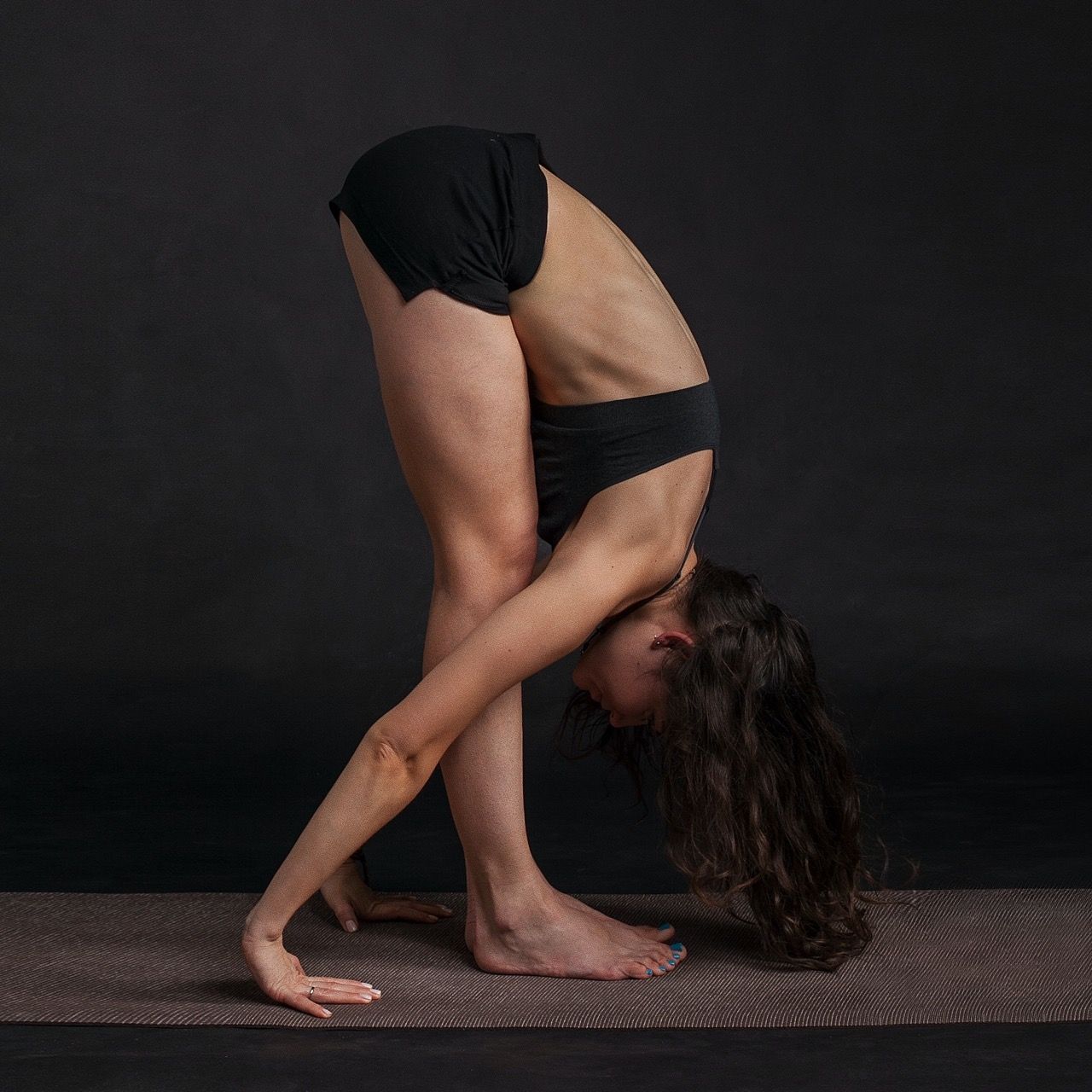 Photo by Roman Davayposmotrim: https://www.pexels.com/photo/woman-wearing-black-sports-bra-reaching-floor-while-standing-35987/