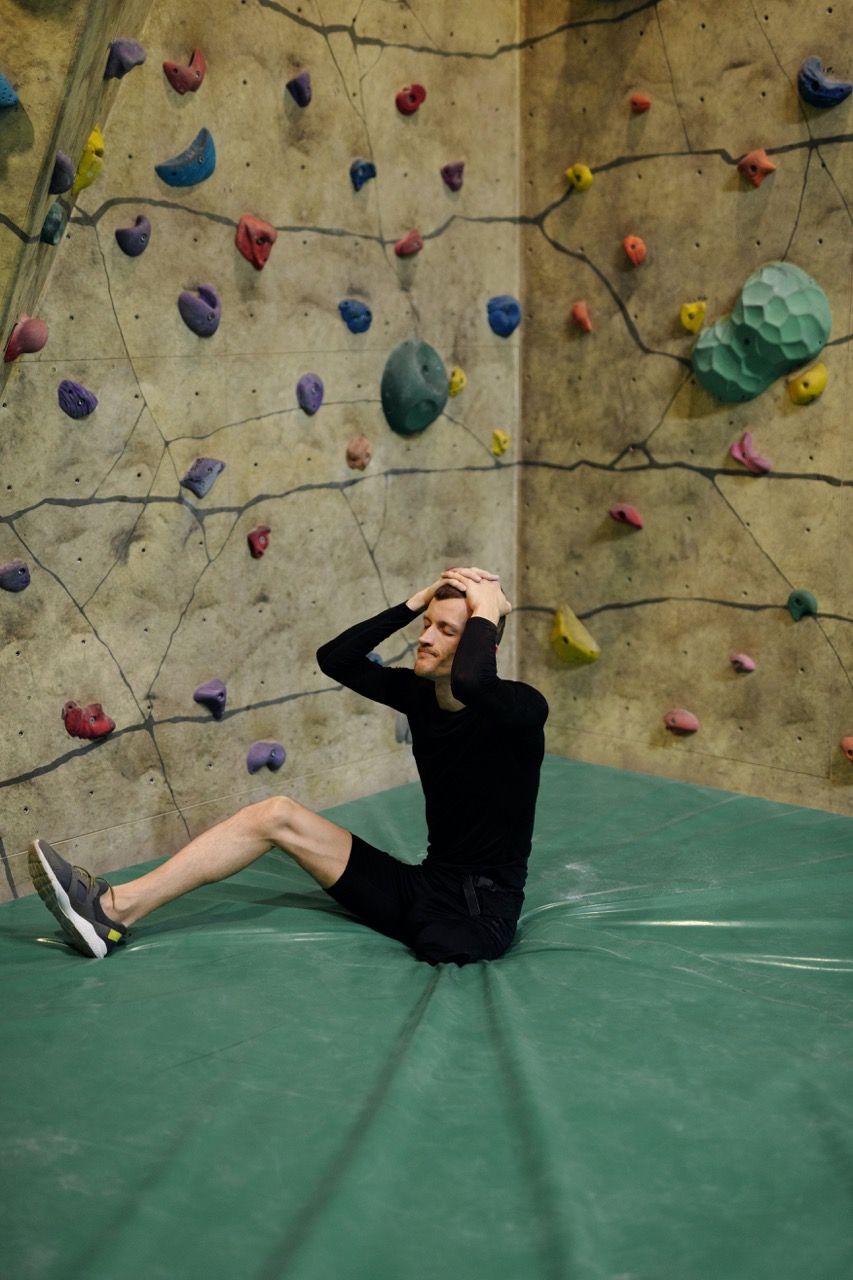 Photo by ShotPot: https://www.pexels.com/photo/man-sitting-by-climbing-wall-4045665/